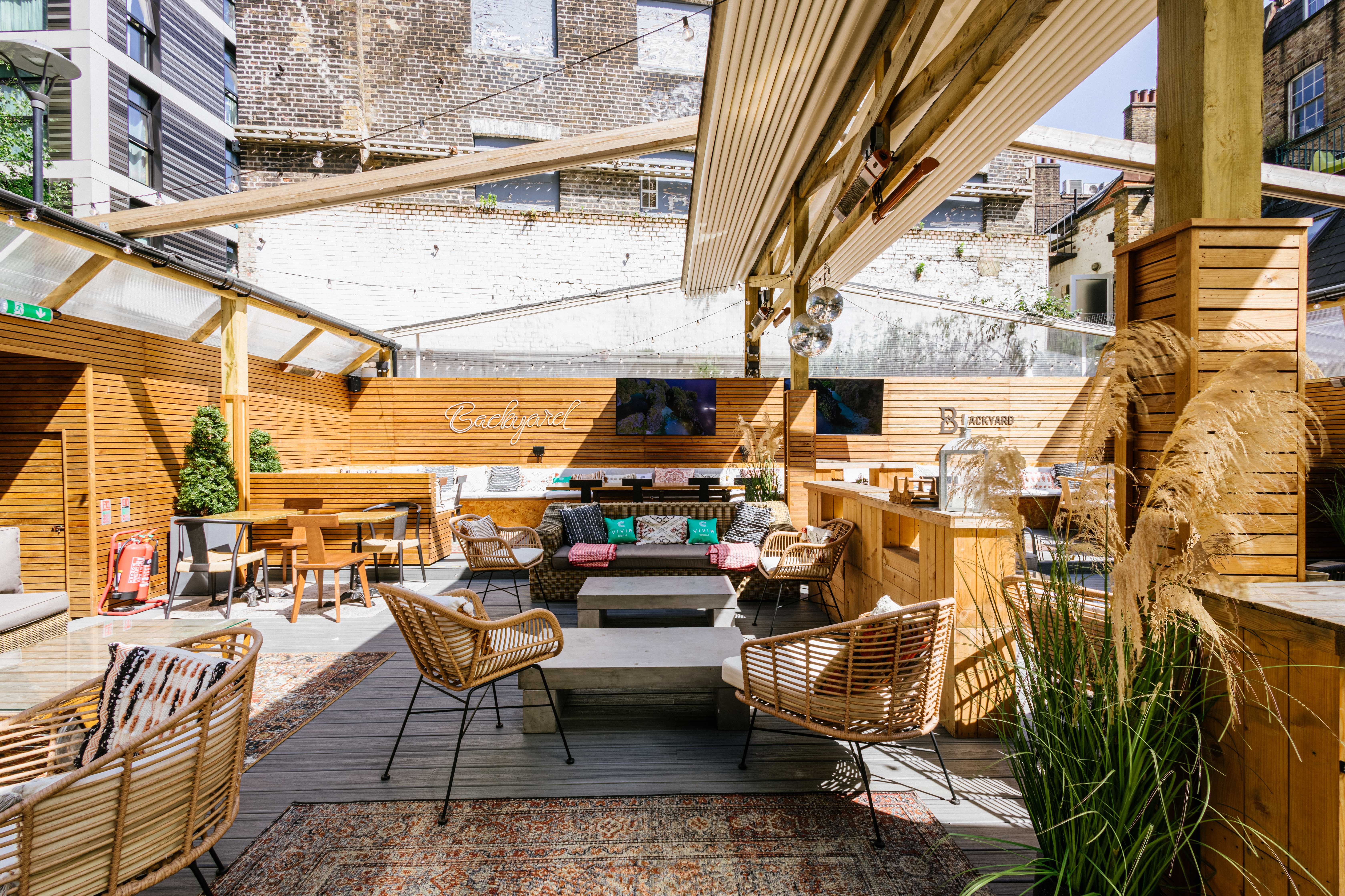 The Light Bar's Backyard Smoking Area - Beautiful outdoor summer party venue with ambient lighting